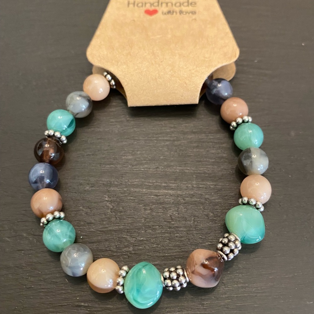 Brand new, never worn. Handmade, Artisan beaded stretch bracelet